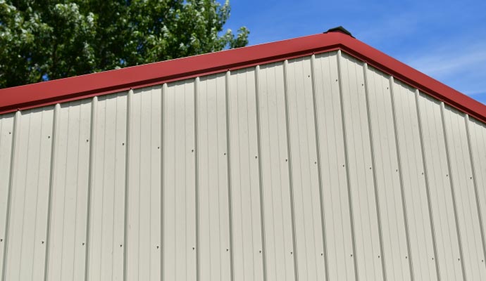 Installed metal siding on the house